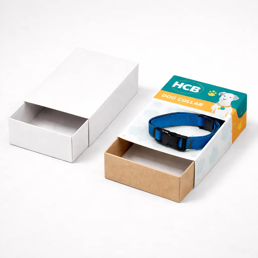Two drawer-style sleeve boxes, one blank and one displaying a blue dog collar inside. class=